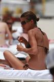 th_24785_Elisabetta_Canalis_in_bikini_on_beach_in_Miami_CU_ISA_050708_13_122_1101lo.jpg