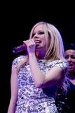 http://img120.imagevenue.com/loc1109/th_63938_Celeb-City.org_-_Avril_Lavigne_at_her_he_Best_Damn_Tour_in_Chicago0011_122_1109lo.jpg